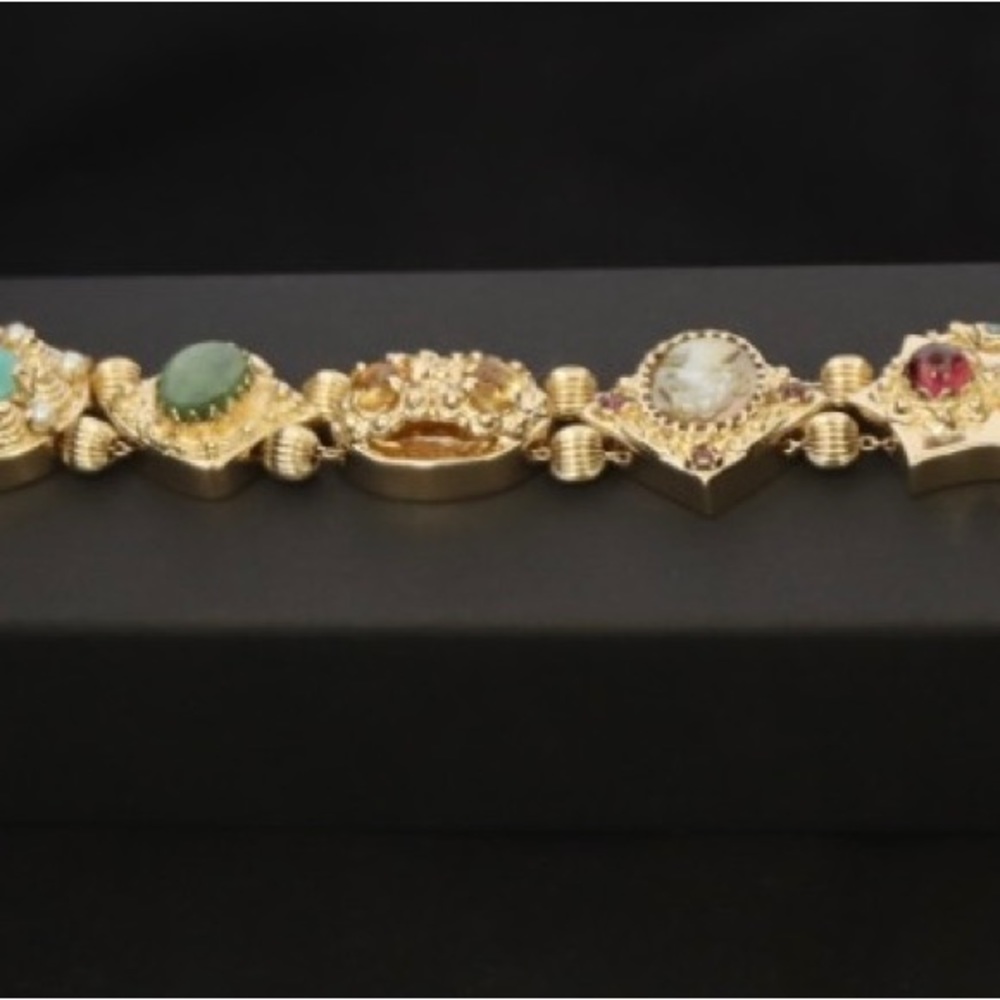 Estate pre-owned 14K solid gold multi-gemstone slide charm bracelet
